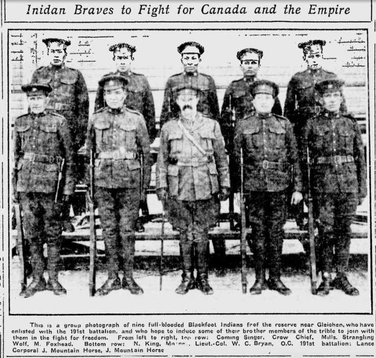 Black and white photograph, in newsprint. Ten indigenous men stand at attention in two rows. They are all dressed in army uniforms.
